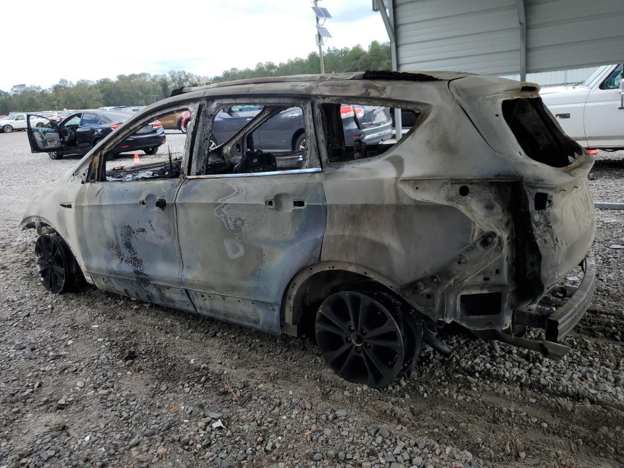 2018 Ford Escape VIN 1FMCU0GD4JUC84720 Copart auction photo, burn damage thumbnail 2