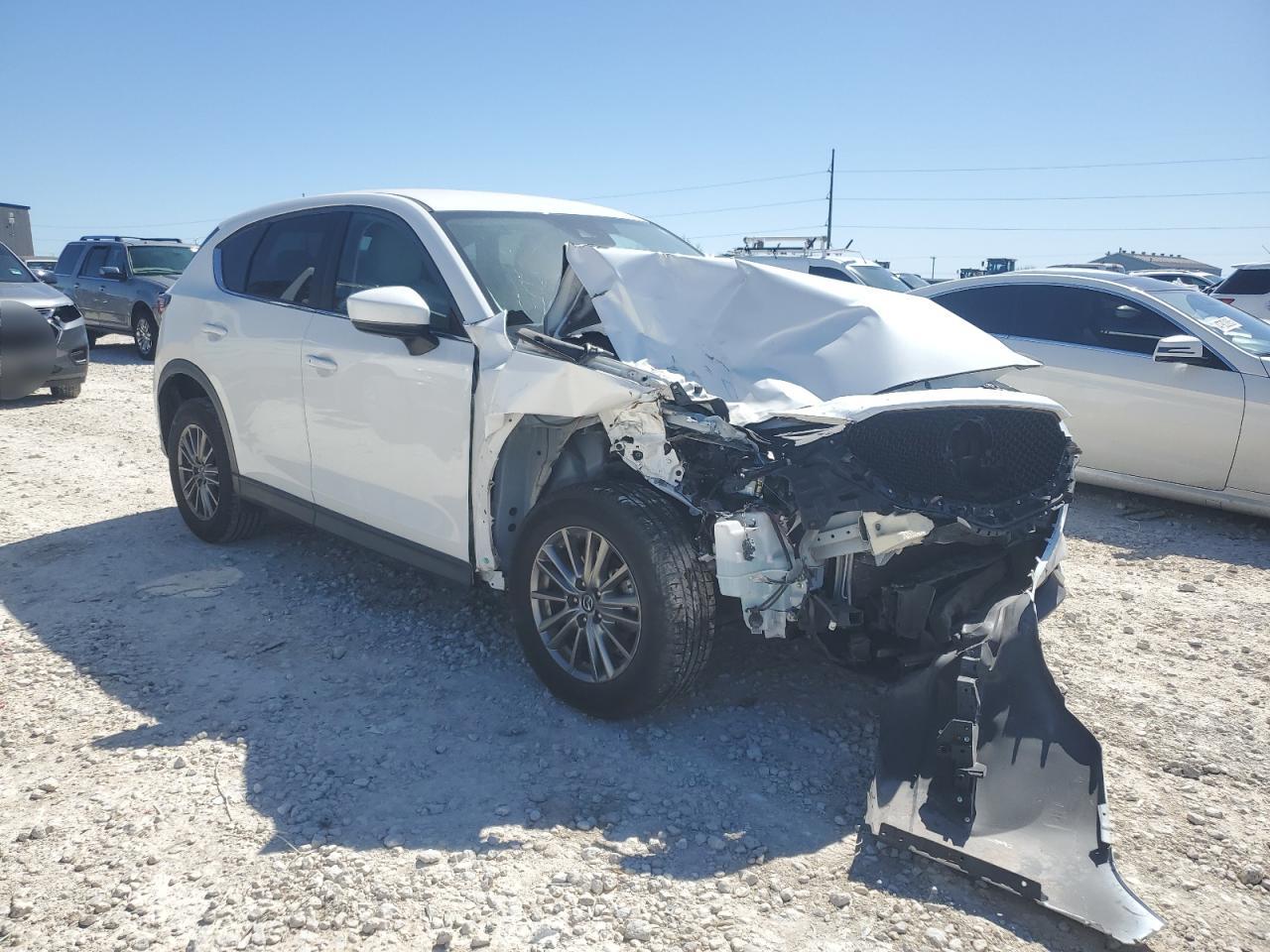 2017 Mazda CX-5 VIN JM3KFACL4H0133883 Copart auction photo, front end / minor dent/scratches damage thumbnail 4
