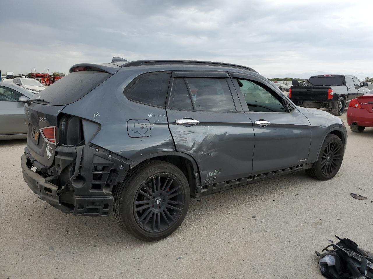 2015 BMW X1 VIN WBAVM1C55FV317773 Copart auction photo, rear end / minor dent/scratches damage thumbnail 3