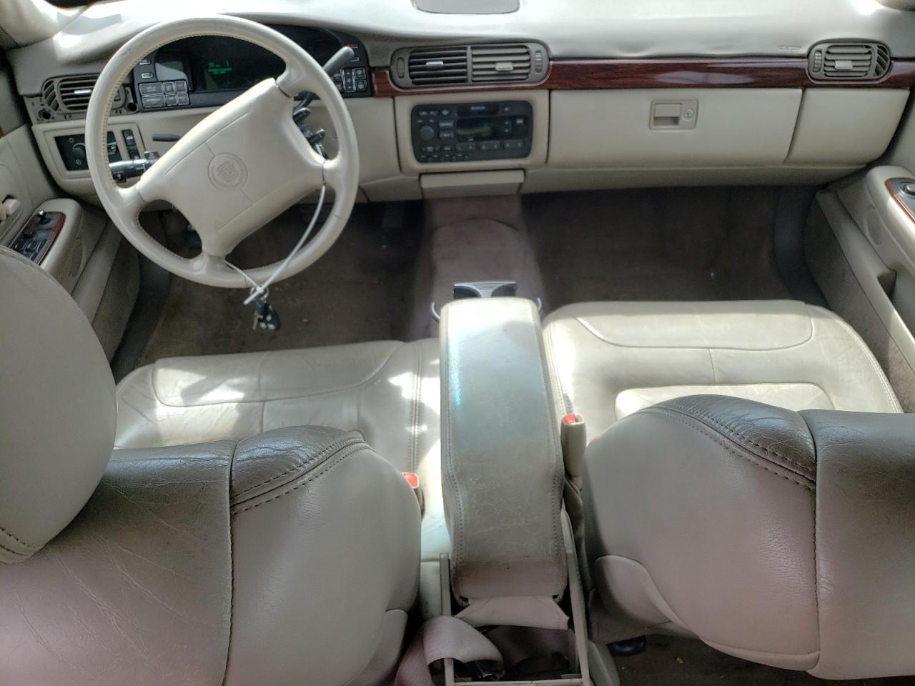 1998 Cadillac De Ville VIN 1G6KD54Y2WU797558 Copart auction photo, side / front end damage thumbnail 8