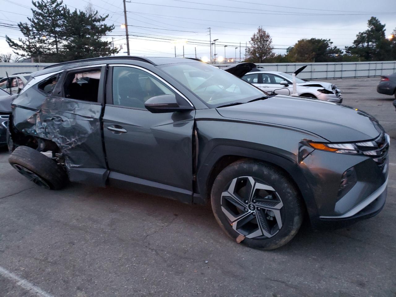 2022 Hyundai Tucson VIN 5NMJF3AEXNH064746 Copart auction photo, rear end / side damage thumbnail 4