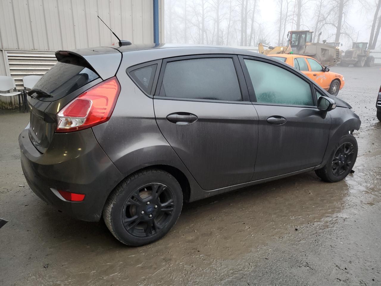 2015 Ford Fiesta VIN 3FADP4EJ0FM164382 Copart auction photo, front end damage thumbnail 3