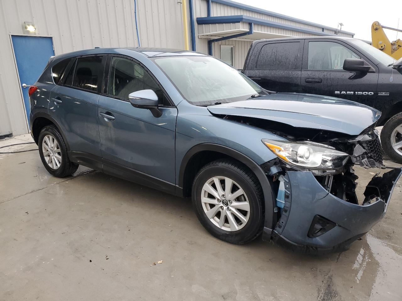 2015 Mazda CX-5 VIN JM3KE2CY7F0505833 Copart auction photo, front end damage thumbnail 4
