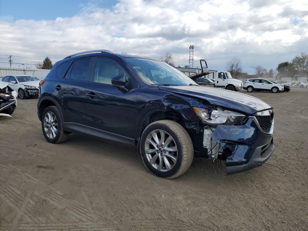 2015 Mazda CX-5 VIN JM3KE4DY1F0447051 Copart auction photo, front end / undercarriage damage thumbnail 4