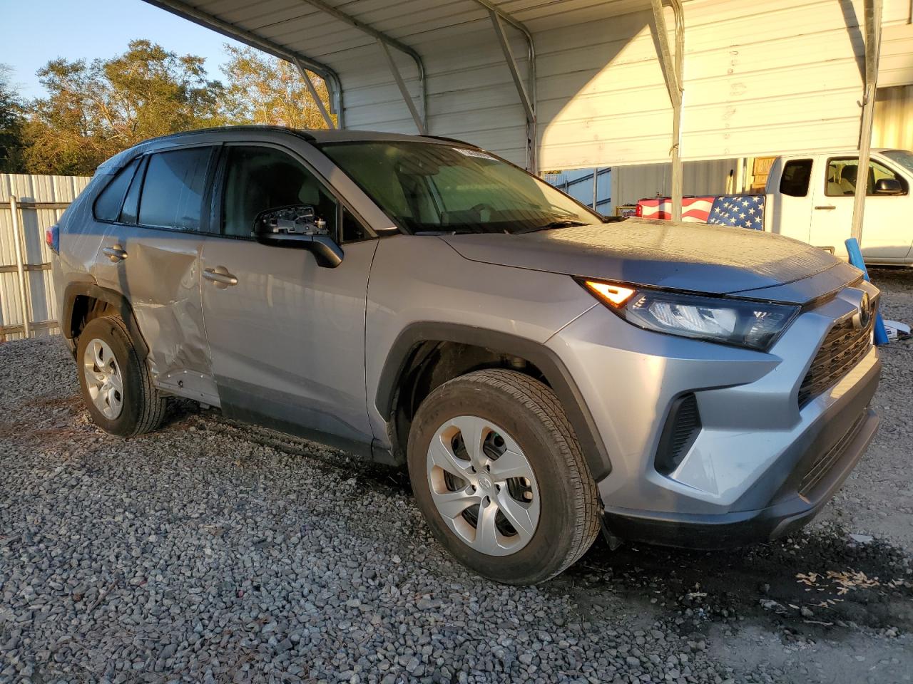 2020 Toyota RAV 4 VIN 2T3H1RFV4LC045094 Copart auction photo, side damage thumbnail 4