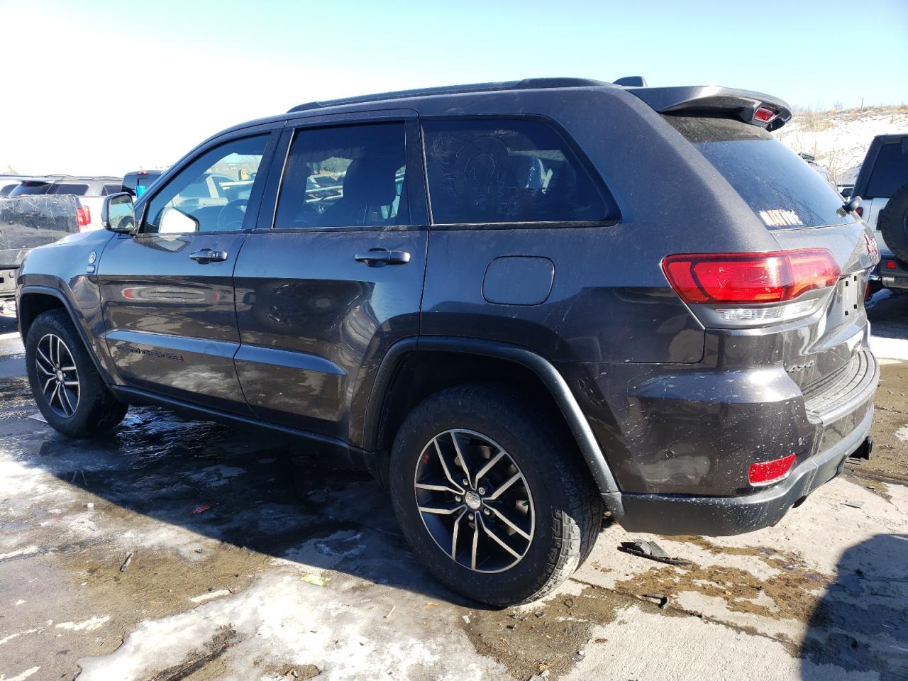 2017 Jeep Grand Cherokee VIN 1C4RJFLG4HC754853 Copart auction photo, side / rear end damage thumbnail 2