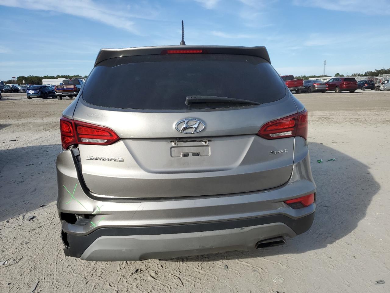 2018 Hyundai Santa Fe VIN 5XYZT3LBXJG569916 Copart auction photo, rear end damage thumbnail 6