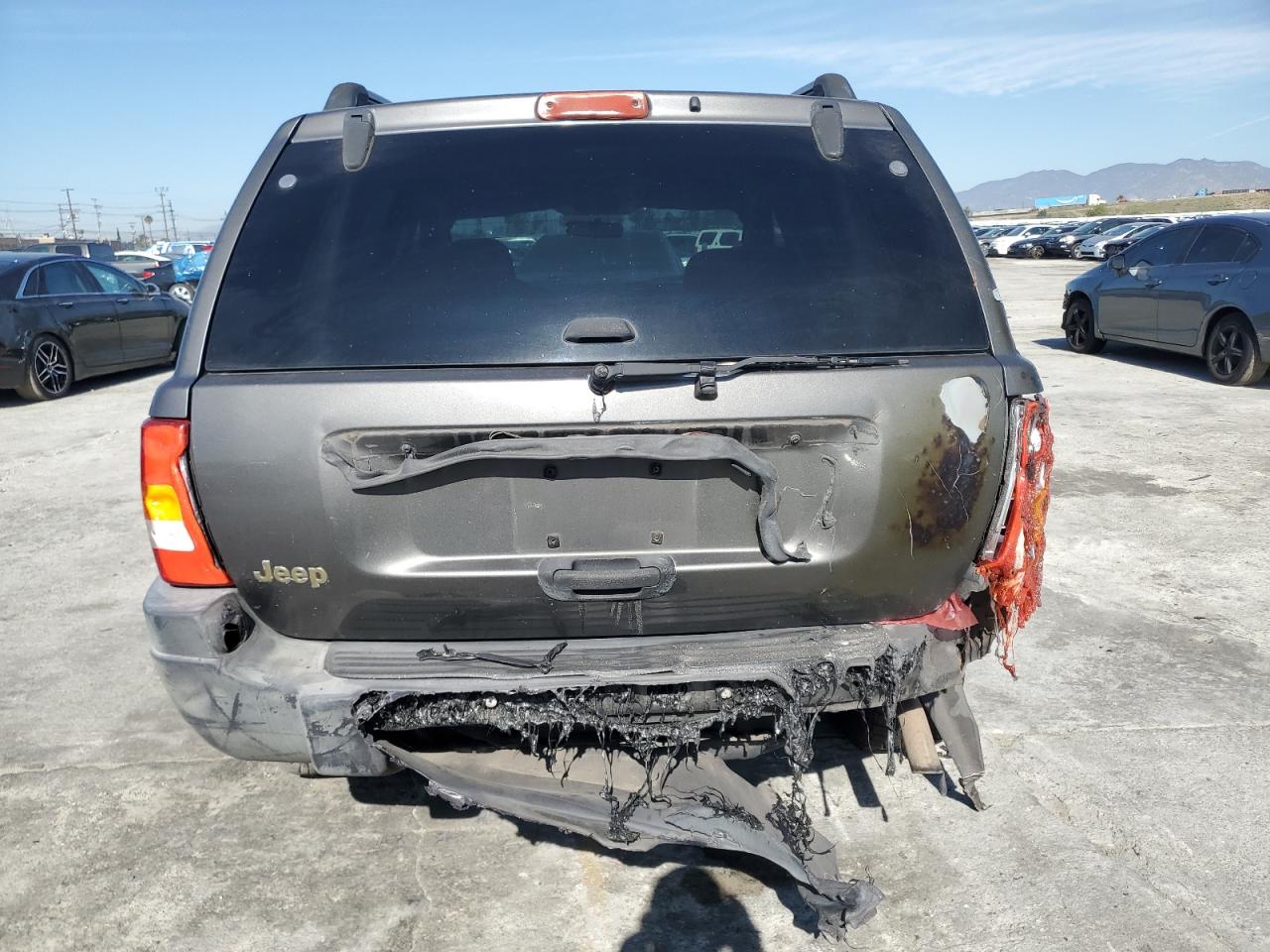 2004 Jeep Grand Cherokee VIN 1J4GX48S44C360524 Copart auction photo, burn damage thumbnail 6