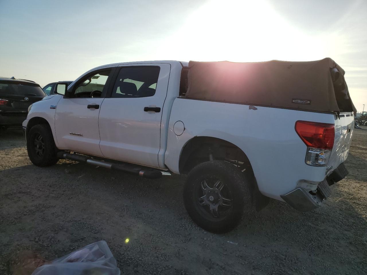 2012 Toyota Tundra VIN 5TFEY5F12CX120714 Copart auction photo, rear end / front end damage thumbnail 2