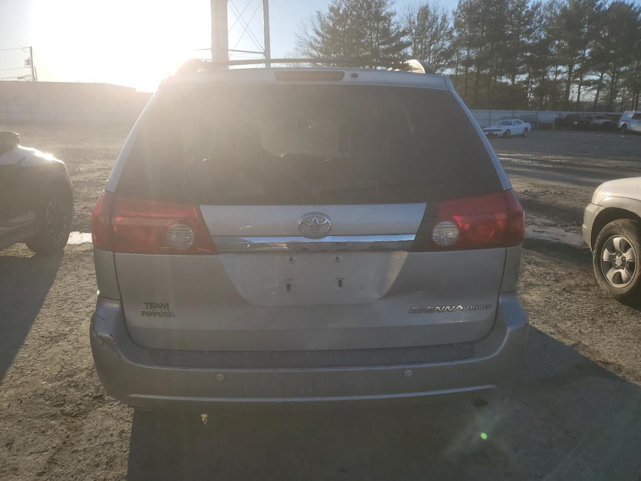2009 Toyota Sienna VIN 5TDZK22C69S230026 Copart auction photo, front end / rear end damage thumbnail 6