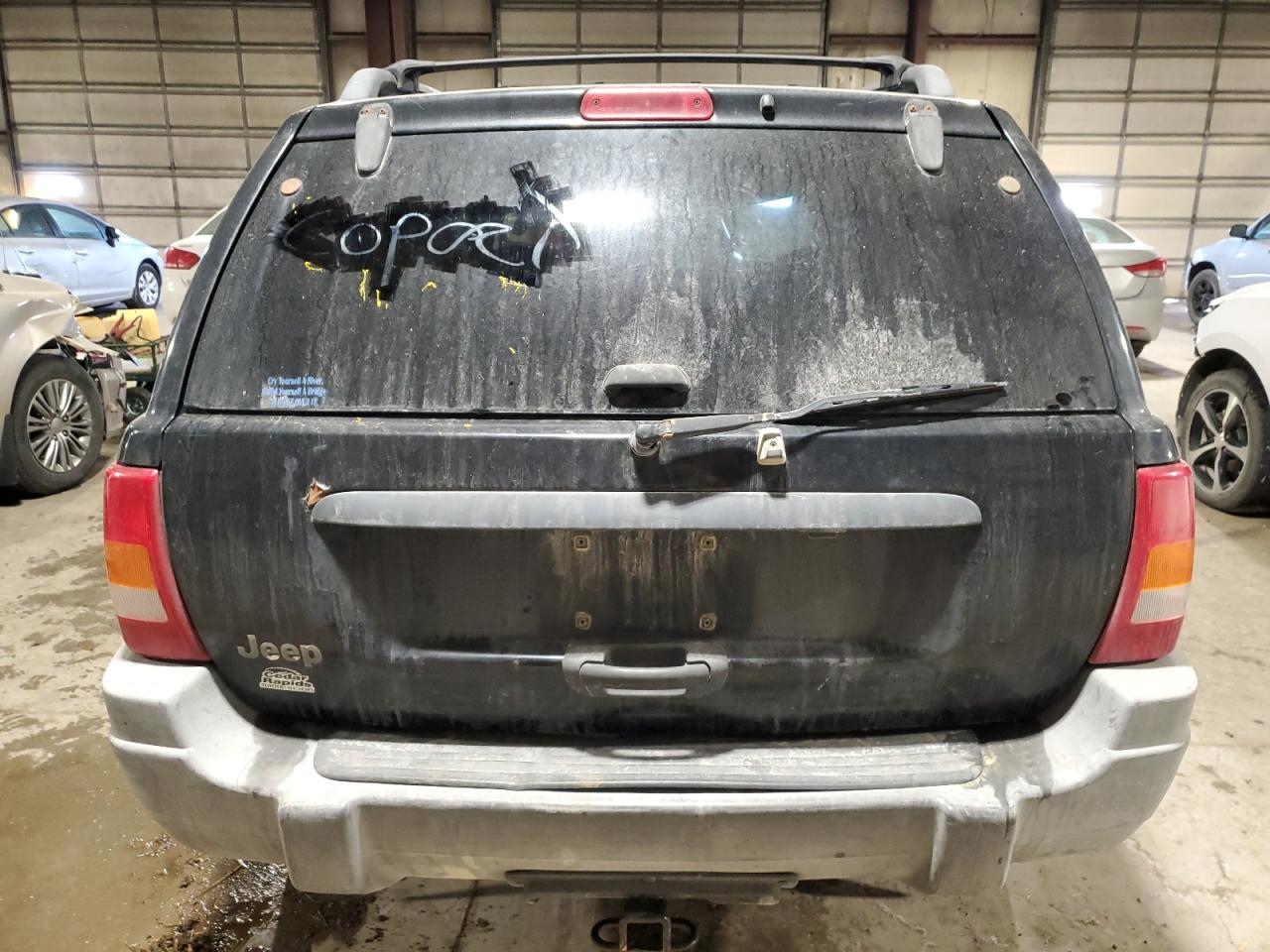 2000 Jeep Grand Cherokee VIN 1J4GW48SXYC100170 Copart auction photo, front end / minor dent/scratches damage thumbnail 6