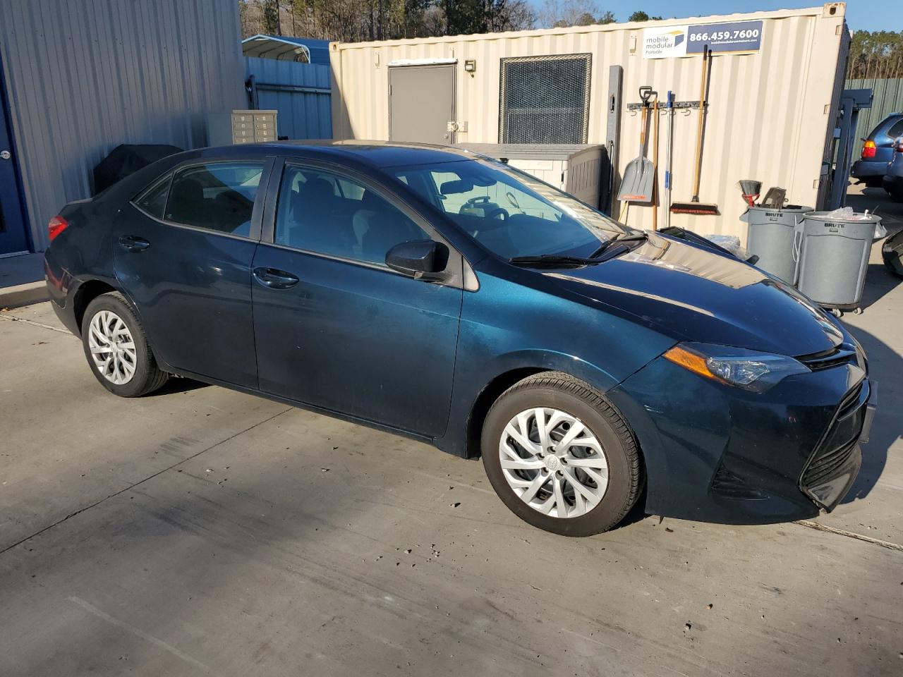2018 Toyota Corolla VIN 5YFBURHE6JP848411 Copart auction photo, side / front end damage thumbnail 4