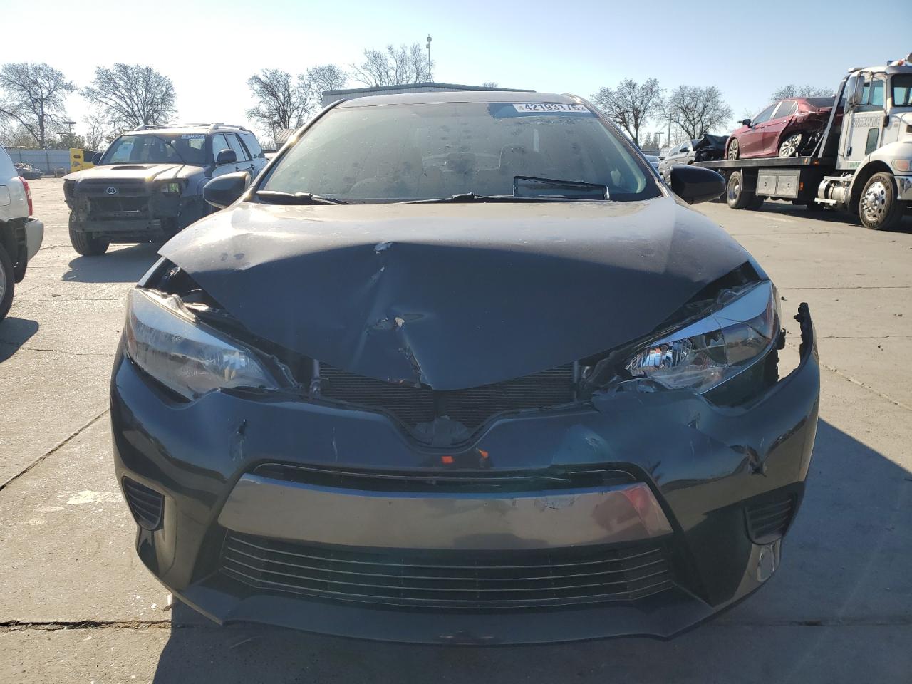 2015 Toyota Corolla VIN 5YFBURHE6FP319886 Copart auction photo, front end damage thumbnail 5