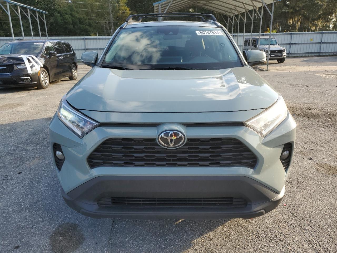 2021 Toyota RAV 4 VIN 2T3C1RFV5MW162208 Copart auction photo, side damage thumbnail 5