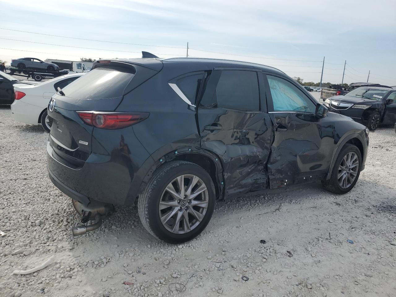 2019 Mazda CX-5 VIN JM3KFADM5K1542046 Copart auction photo, side damage thumbnail 3