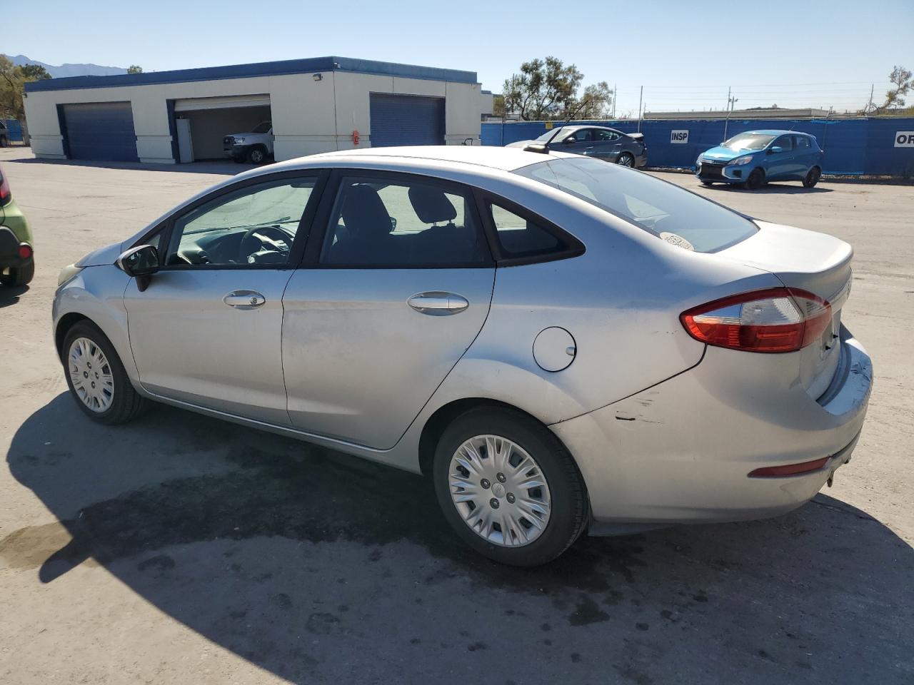 2015 Ford Fiesta VIN 3FADP4AJ6FM148208 Copart auction photo, minor dent/scratches / hail damage thumbnail 2