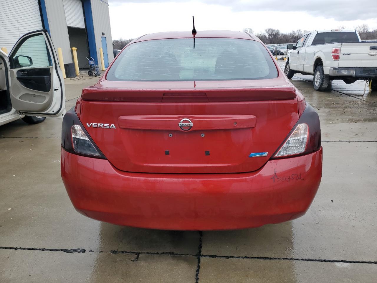 2014 Nissan Versa VIN 3N1CN7AP3EL868493 Copart auction photo, rear end / minor dent/scratches damage thumbnail 6