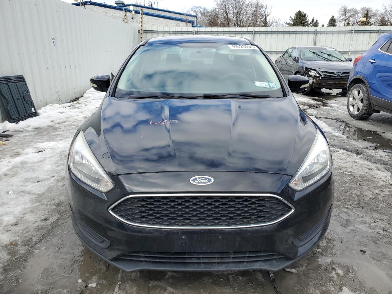 2016 Ford Focus VIN 1FADP3F21GL218812 Copart auction photo, rear end / minor dent/scratches damage thumbnail 5