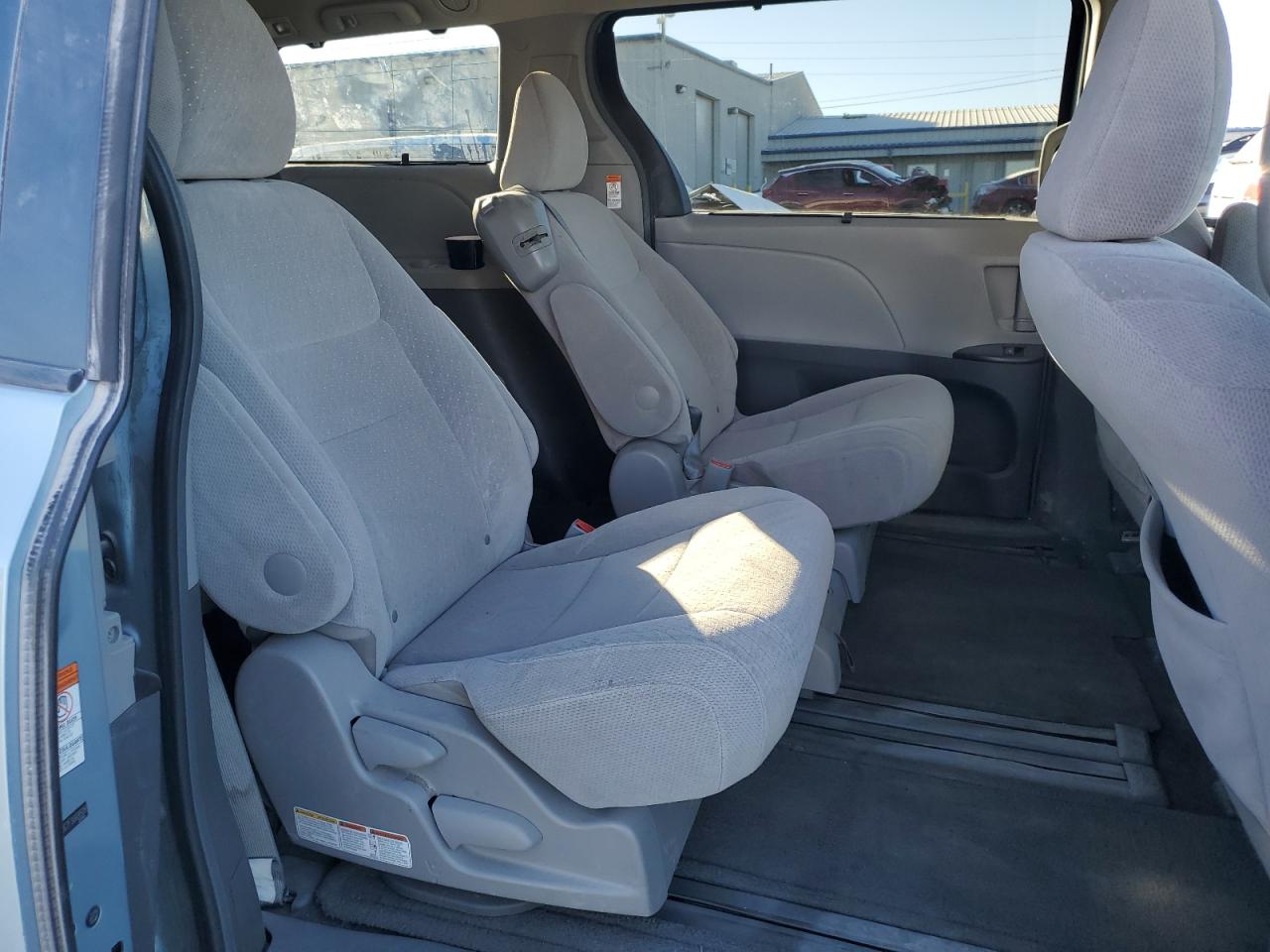 2015 Toyota Sienna VIN 5TDKK3DC7FS669509 Copart auction photo, front end / side damage thumbnail 11