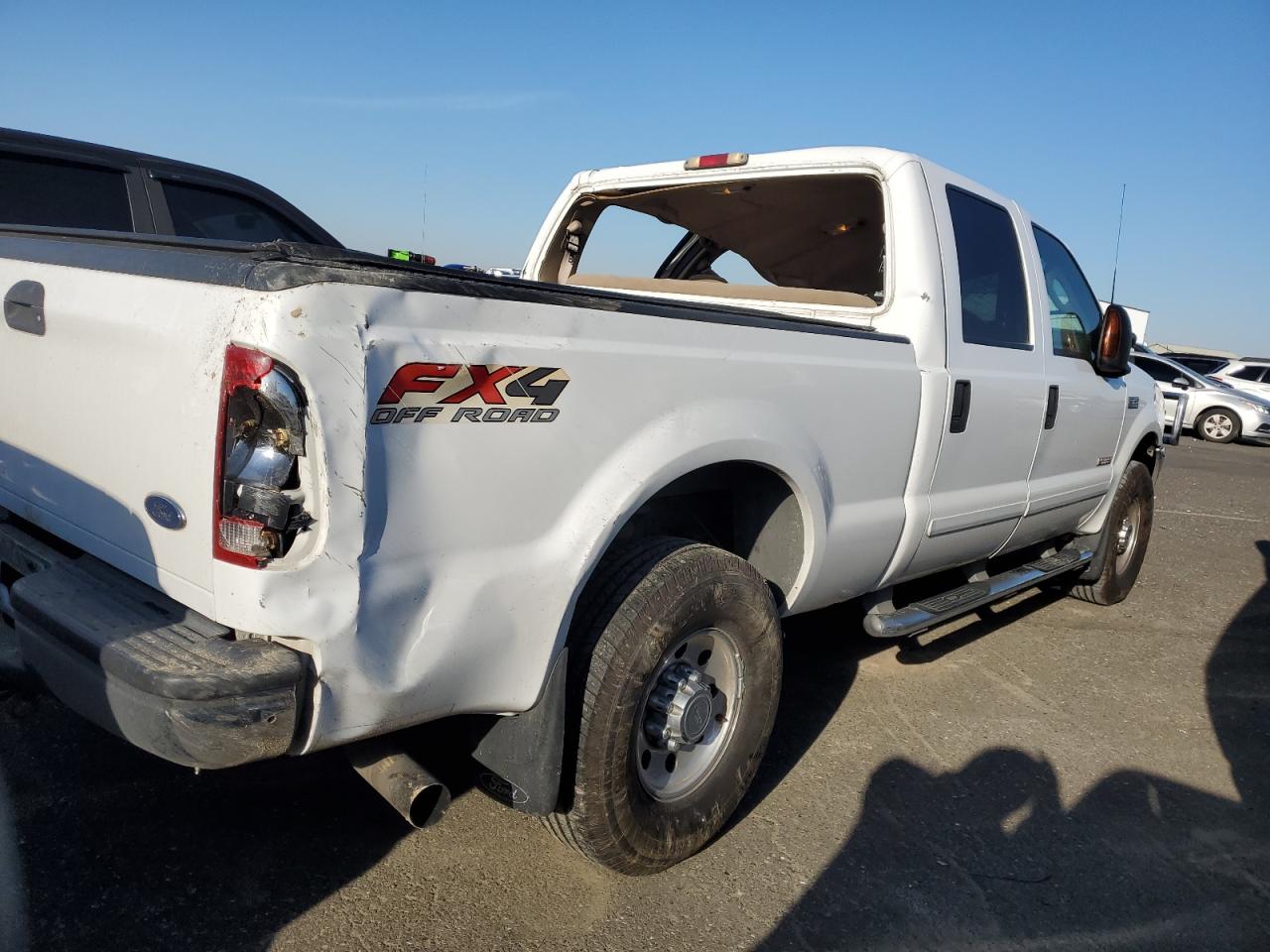 2003 Ford F250 VIN 1FTNW21PX3EB59692 Copart auction photo, rollover damage thumbnail 3