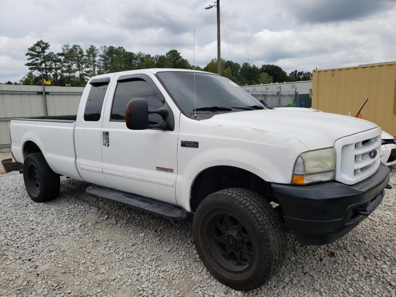 2004 Ford F250 VIN 1FTNX21P04EB76709 Copart auction photo, vandalism / mechanical damage thumbnail 4