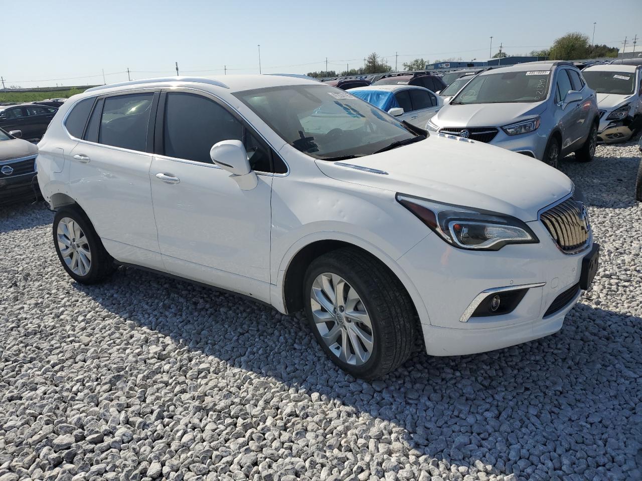 2017 Buick Envision VIN LRBFXESX1HD128067 Copart auction photo, rear end / hail damage thumbnail 4