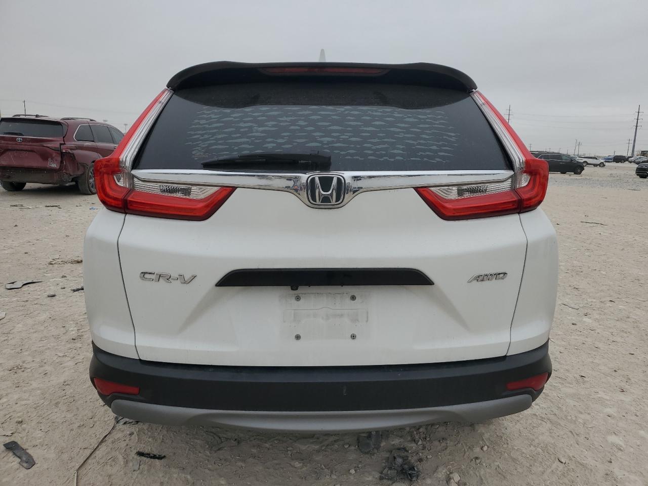 2019 Honda CR-V VIN 2HKRW6H38KH207975 Copart auction photo, front end / minor dent/scratches damage thumbnail 6