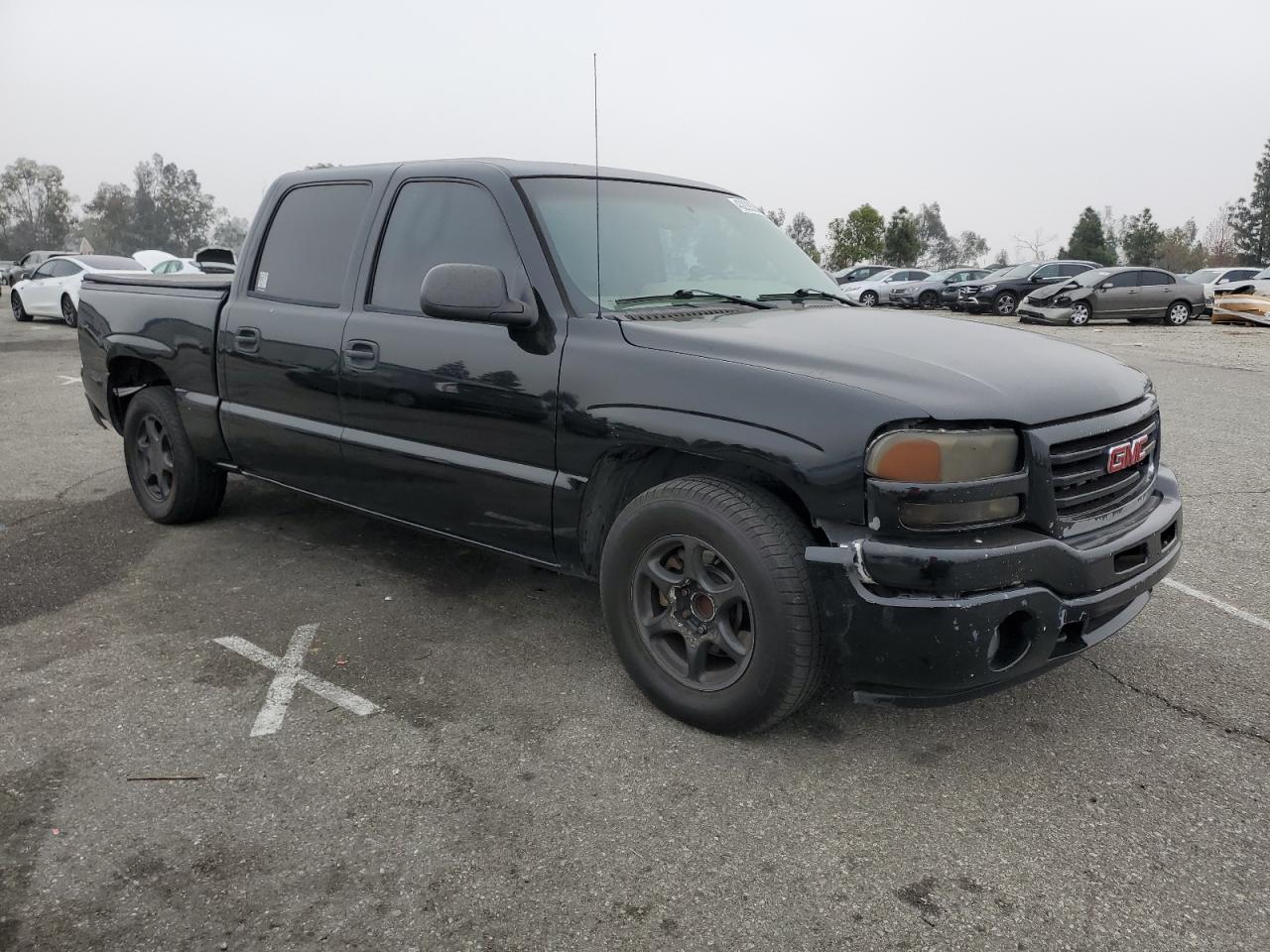 2005 GMC Sierra VIN 2GTEC13T951133490 Copart auction photo, all over damage thumbnail 4