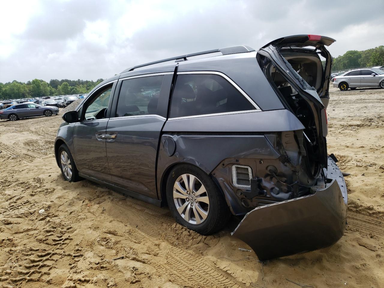 2014 Honda Odyssey VIN 5FNRL5H6XEB033584 Copart auction photo, rear end / all over damage thumbnail 2