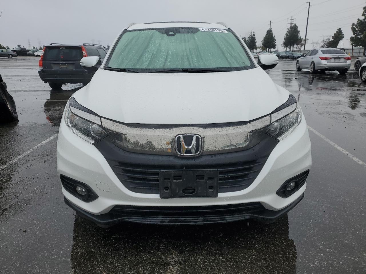 2019 Honda HR-V VIN 3CZRU5H57KM721662 Copart auction photo, side damage thumbnail 5