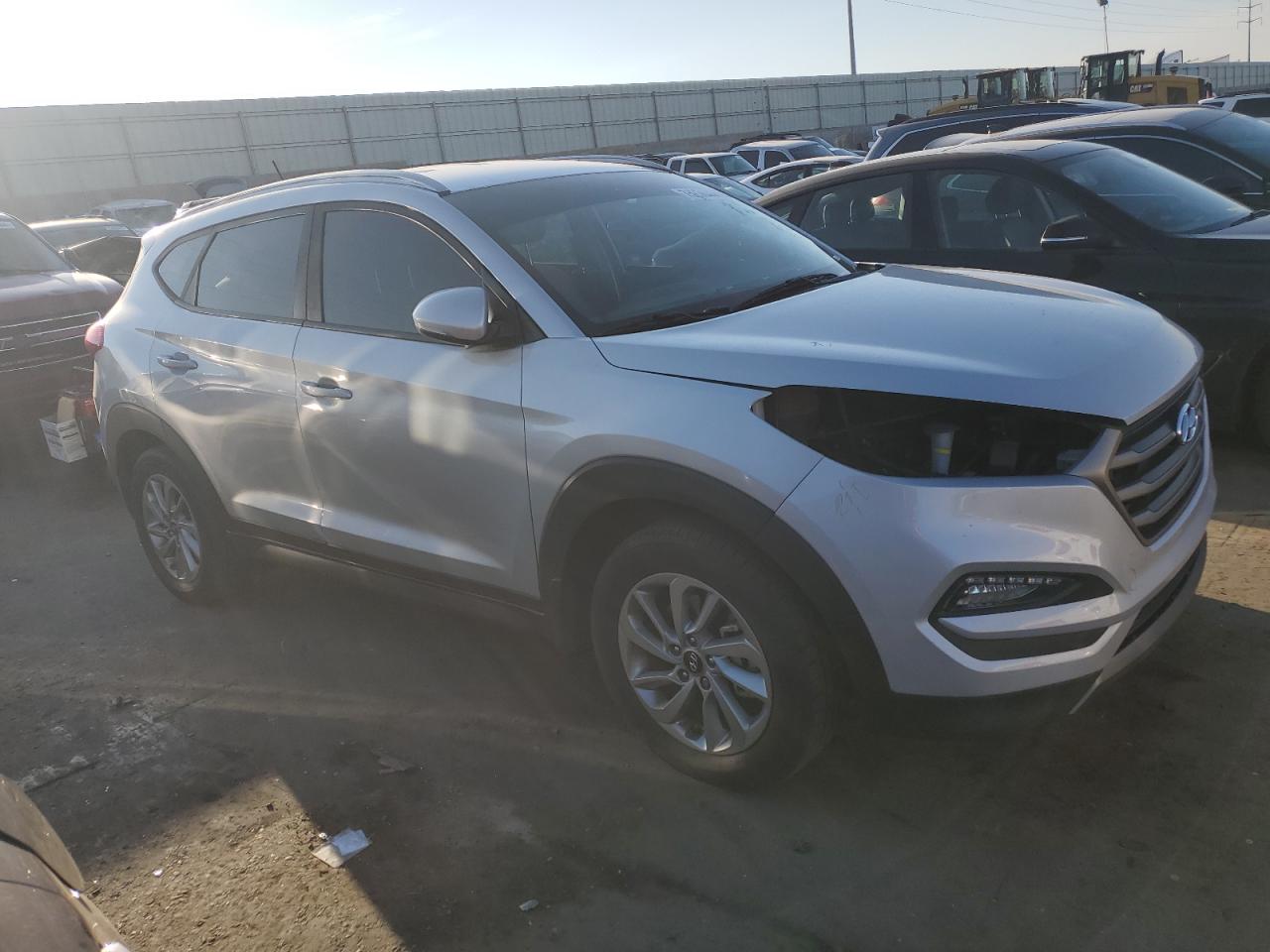 2016 Hyundai Tucson VIN KM8J33A25GU233593 Copart auction photo, partial repair damage thumbnail 4