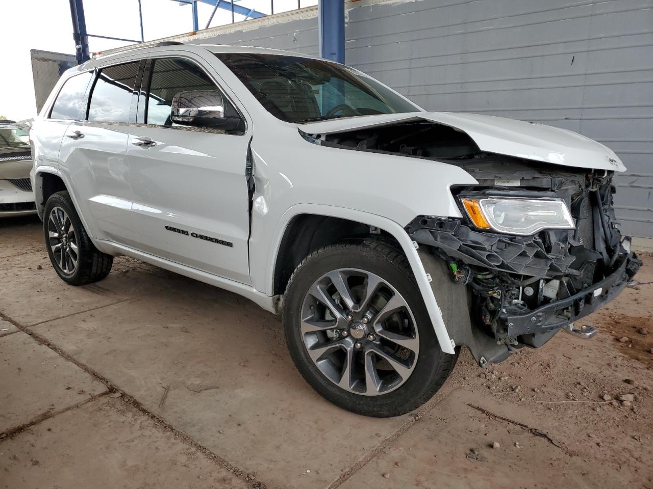 2017 Jeep Grand Cherokee VIN 1C4RJFCG5HC831620 Copart auction photo, front end / side damage thumbnail 4