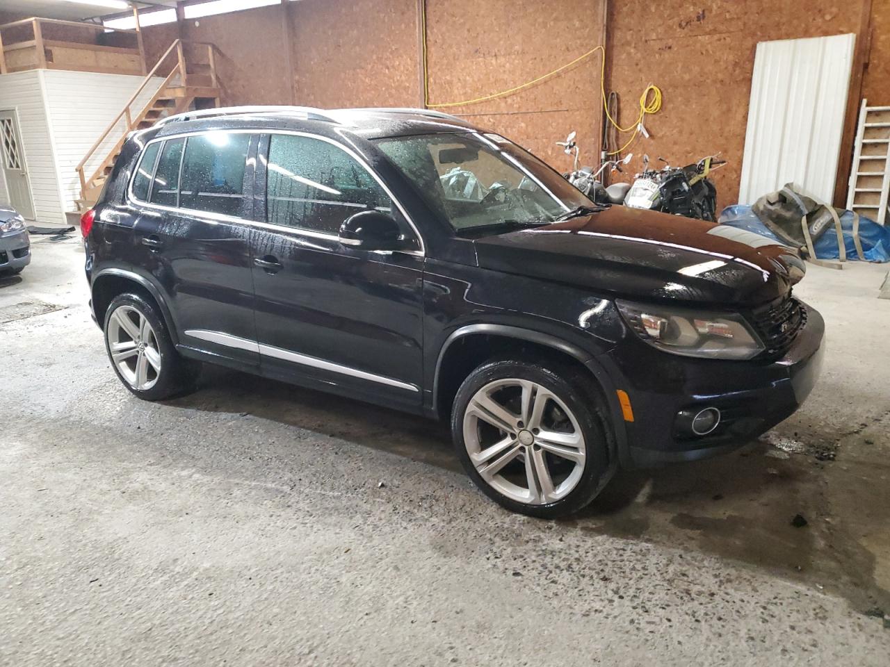 2015 Volkswagen Tiguan VIN WVGBV7AX3FW048821 Copart auction photo, front end / side damage thumbnail 4