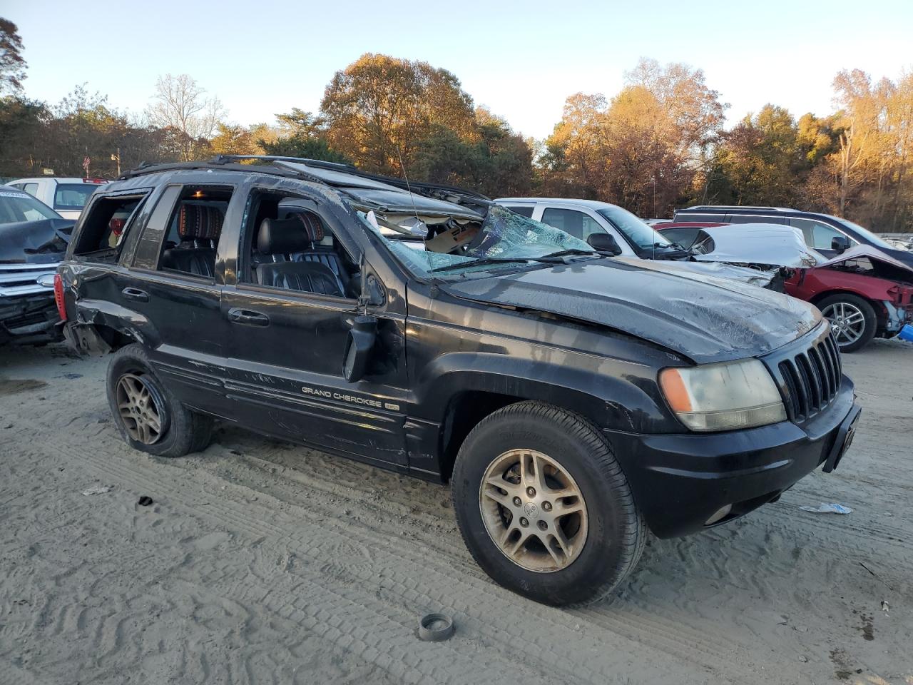1999 Jeep Grand Cherokee VIN 1J4GW68S7XC676809 Copart auction photo, rollover damage thumbnail 4