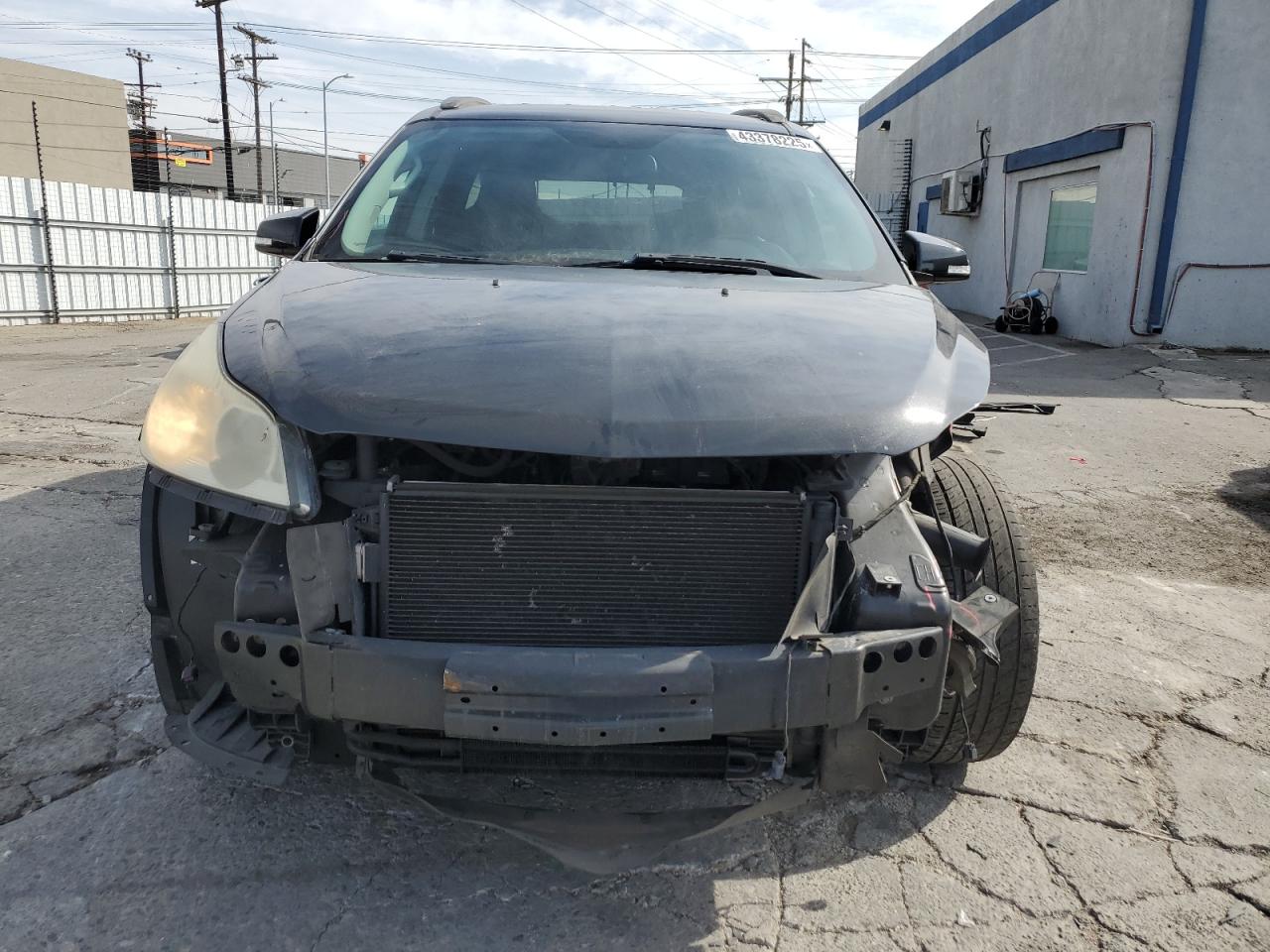 2011 Chevrolet Traverse VIN 1GNKRGED9BJ374937 Copart auction photo, front end / side damage thumbnail 5