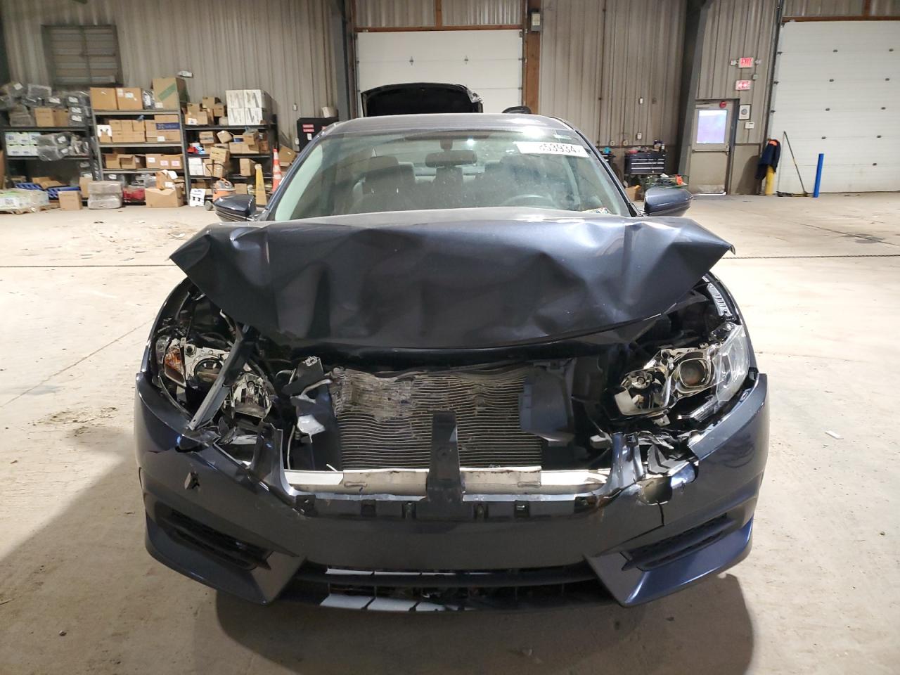 2017 Honda Civic VIN 2HGFC2F55HH561397 Copart auction photo, front end damage thumbnail 5