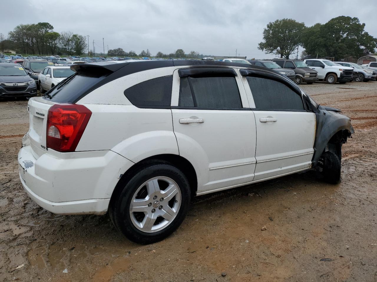 2009 Dodge Caliber VIN 1B3HB48A29D147588 Copart auction photo, burn damage thumbnail 3