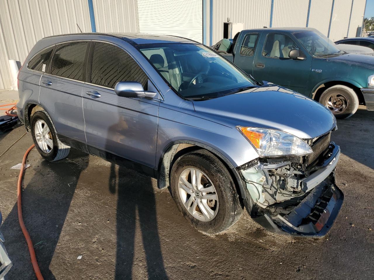 2010 Honda CR-V VIN JHLRE3H7XAC005611 Copart auction photo, front end / side damage thumbnail 4