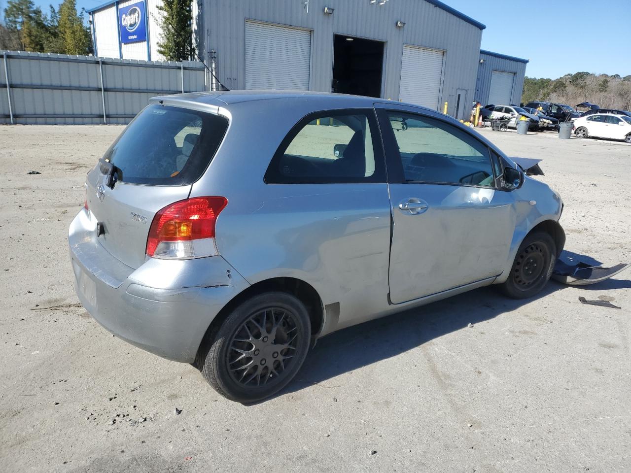 2009 Toyota Yaris VIN JTDJT903395232957 Copart auction photo, front end damage thumbnail 3