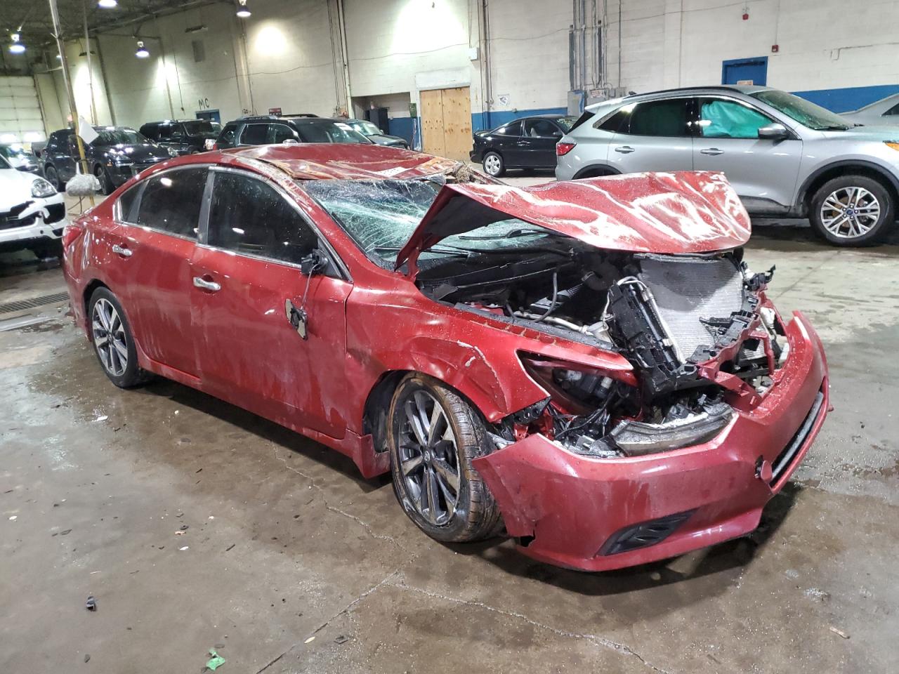 2016 Nissan Altima VIN 1N4AL3AP8GN334529 Copart auction photo, rollover damage thumbnail 4