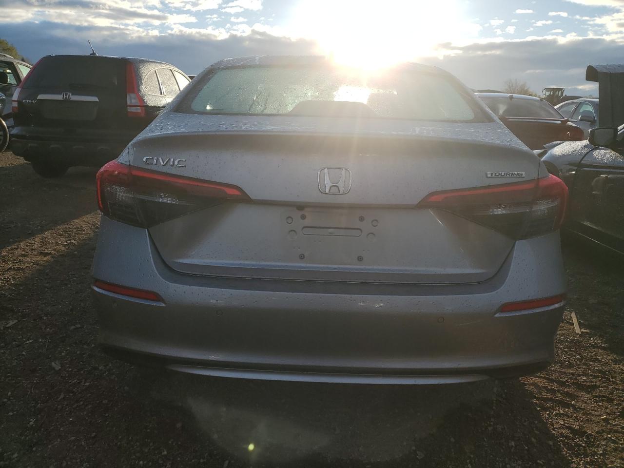 2023 Honda Civic VIN 2HGFE1F90PH321275 Copart auction photo, side / front end damage thumbnail 6
