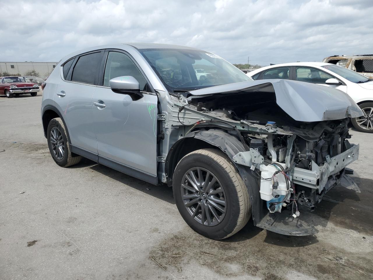 2019 Mazda CX-5 VIN JM3KFBCM4K1565695 Copart auction photo, front end / minor dent/scratches damage thumbnail 4