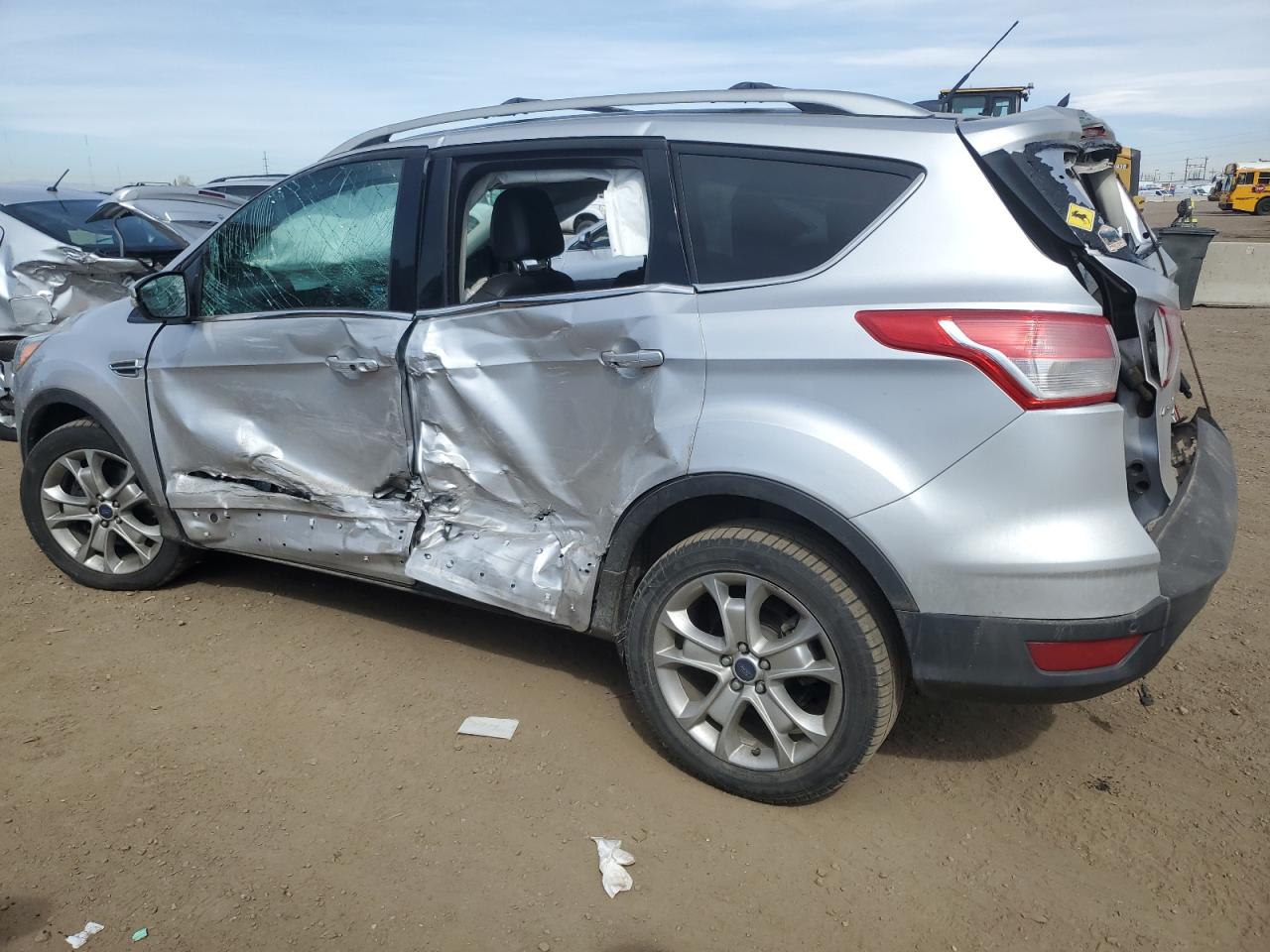 2015 Ford Escape VIN 1FMCU9J98FUC62719 Copart auction photo, side / rear end damage thumbnail 2