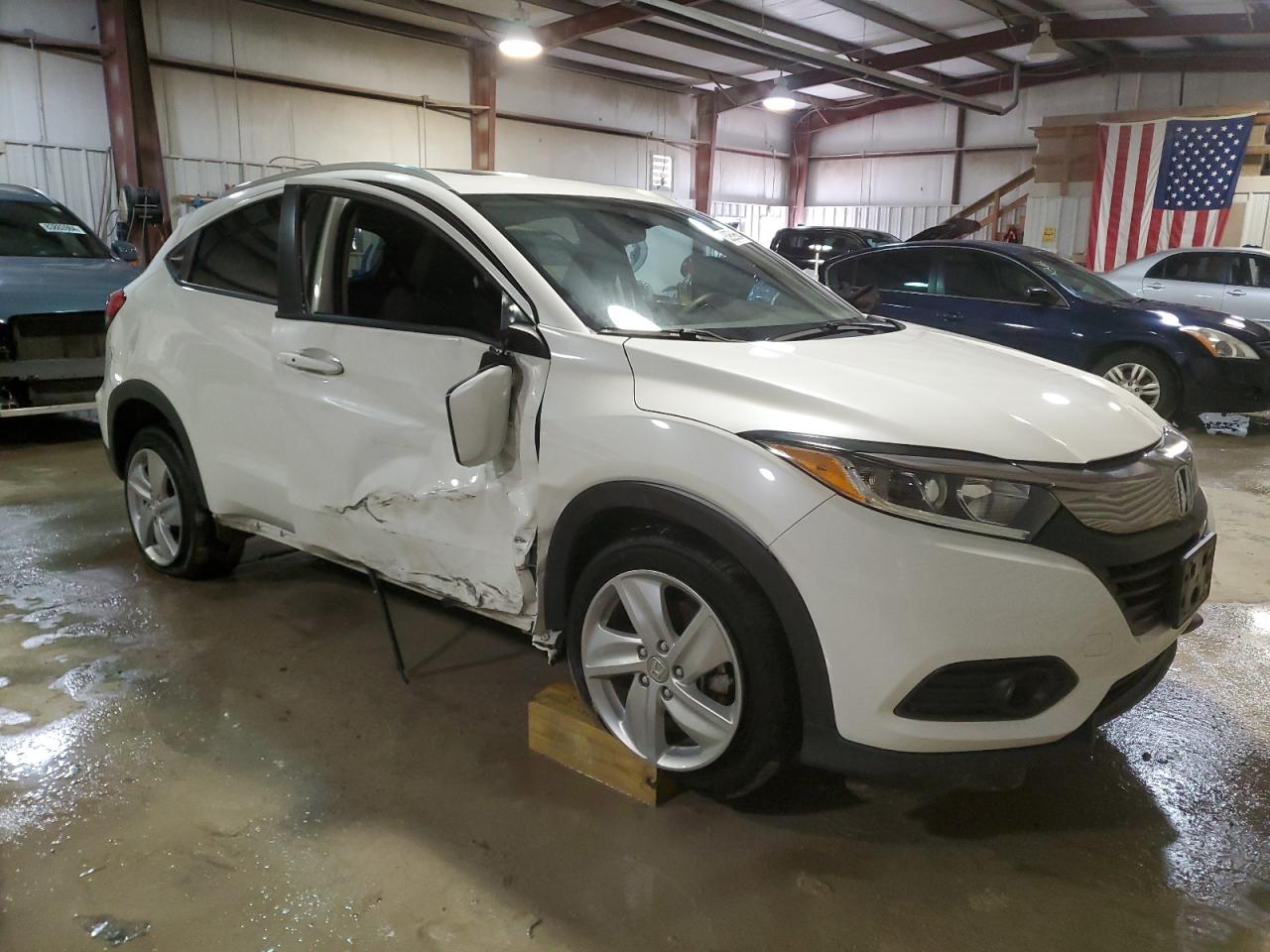 2019 Honda HR-V VIN 3CZRU6H58KM708327 Copart auction photo, side / undercarriage damage thumbnail 4