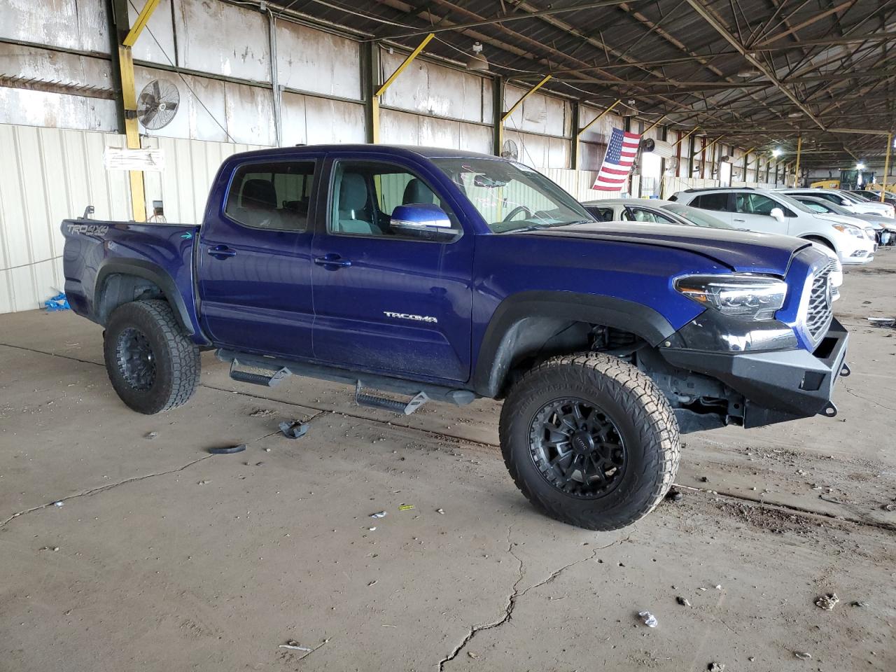 2022 Toyota Tacoma VIN 3TMCZ5AN3NM454595 Copart auction photo, rear end / minor dent/scratches damage thumbnail 4