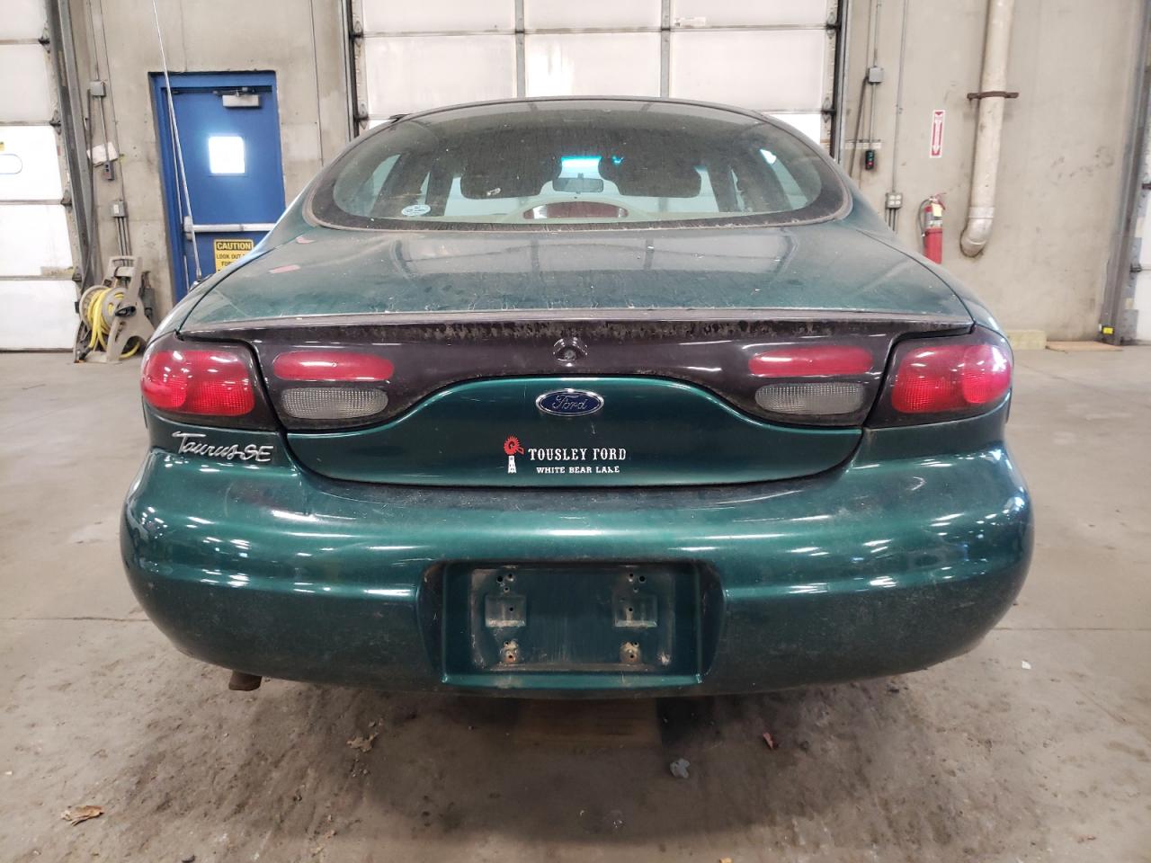 1999 Ford Taurus VIN 1FAFP53U0XG319875 Copart auction photo, front end / undercarriage damage thumbnail 6