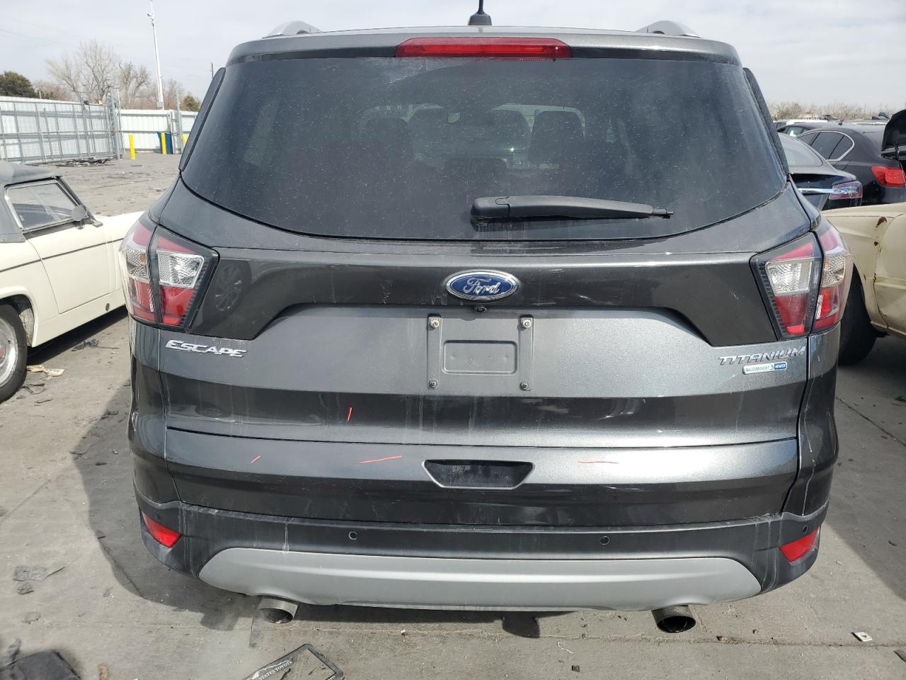 2017 Ford Escape VIN 1FMCU9J96HUA38884 Copart auction photo, front end / side damage thumbnail 6