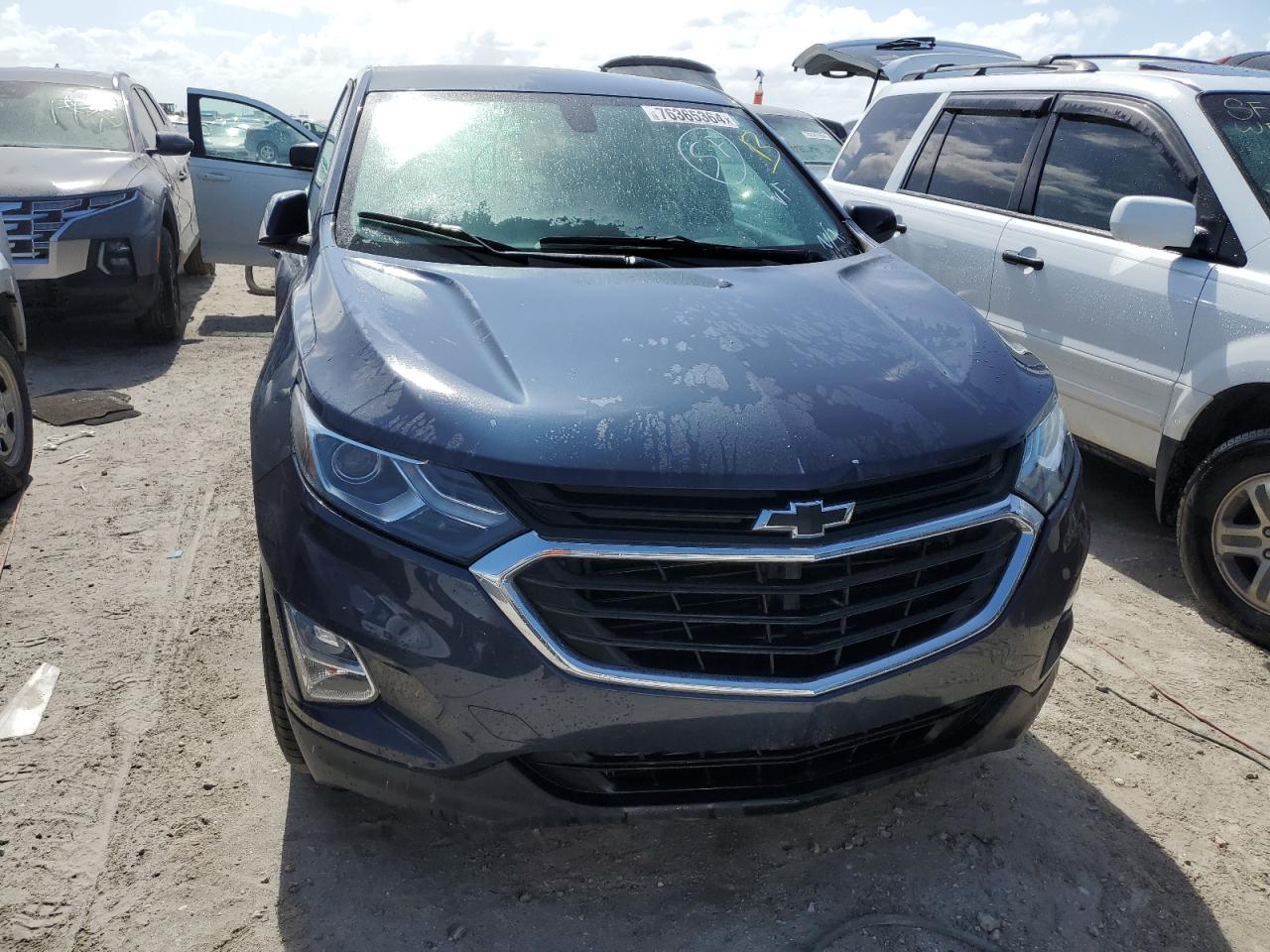 2018 Chevrolet Equinox VIN 3GNAXSEV0JS576978 Copart auction photo, water/flood damage thumbnail 5