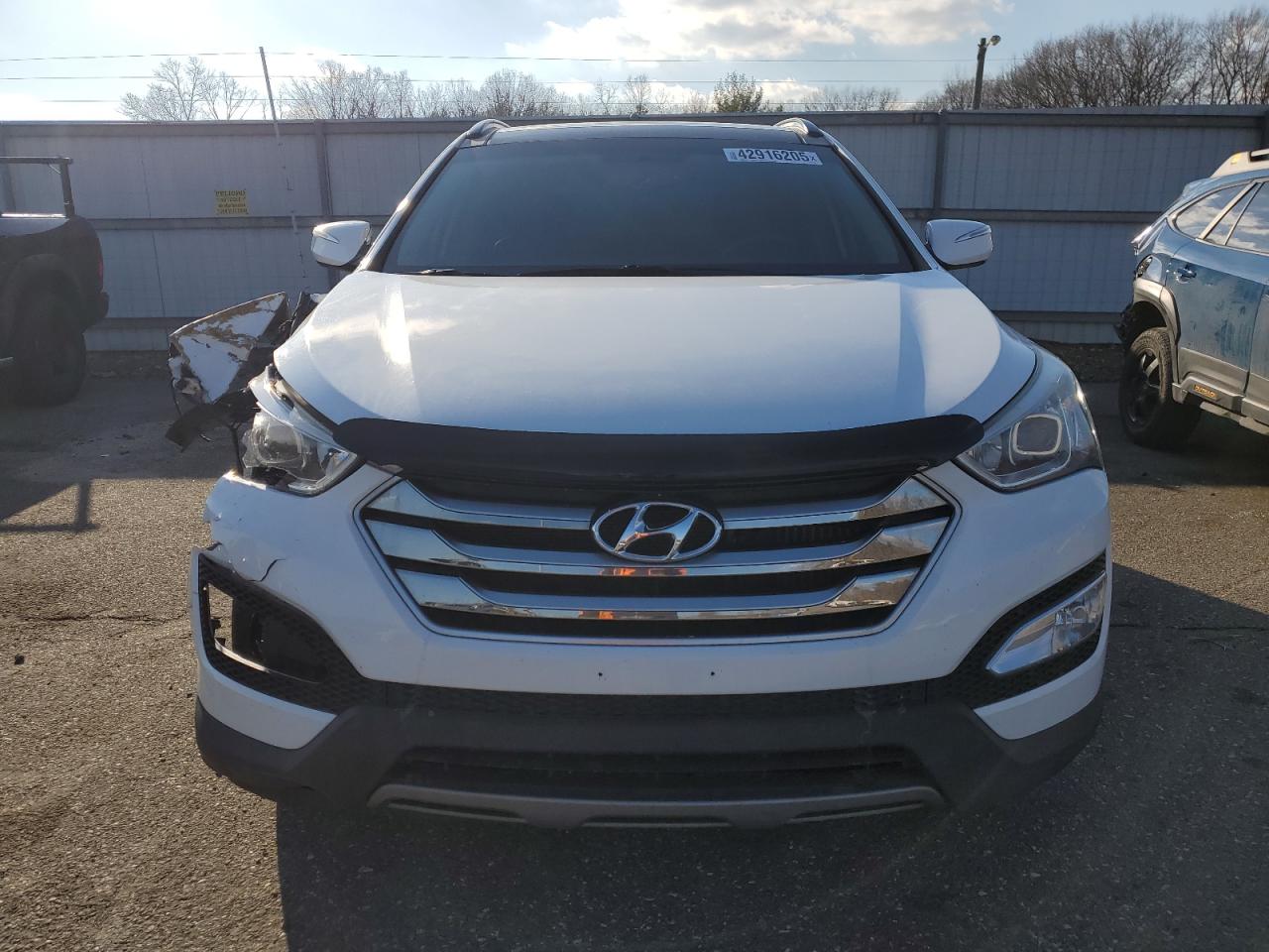 2015 Hyundai Santa Fe VIN 5XYZWDLA0FG235602 Copart auction photo, front end damage thumbnail 5