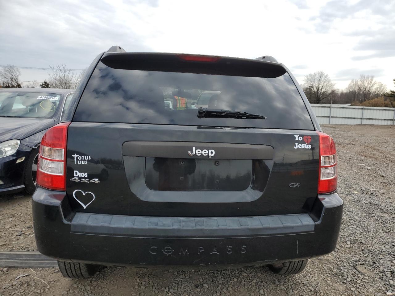 2009 Jeep Compass VIN 1J8FF47B39D137326 Copart auction photo, front end damage thumbnail 6